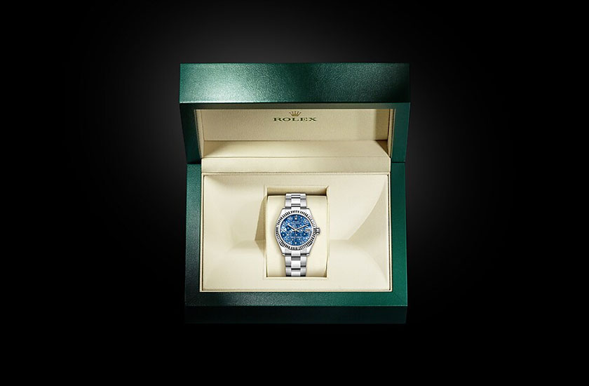 Reloj Rolex Datejust 31 esfera azul azzurro, motivo floral, engastada de diamantes en su estuche Joyería Gordillo