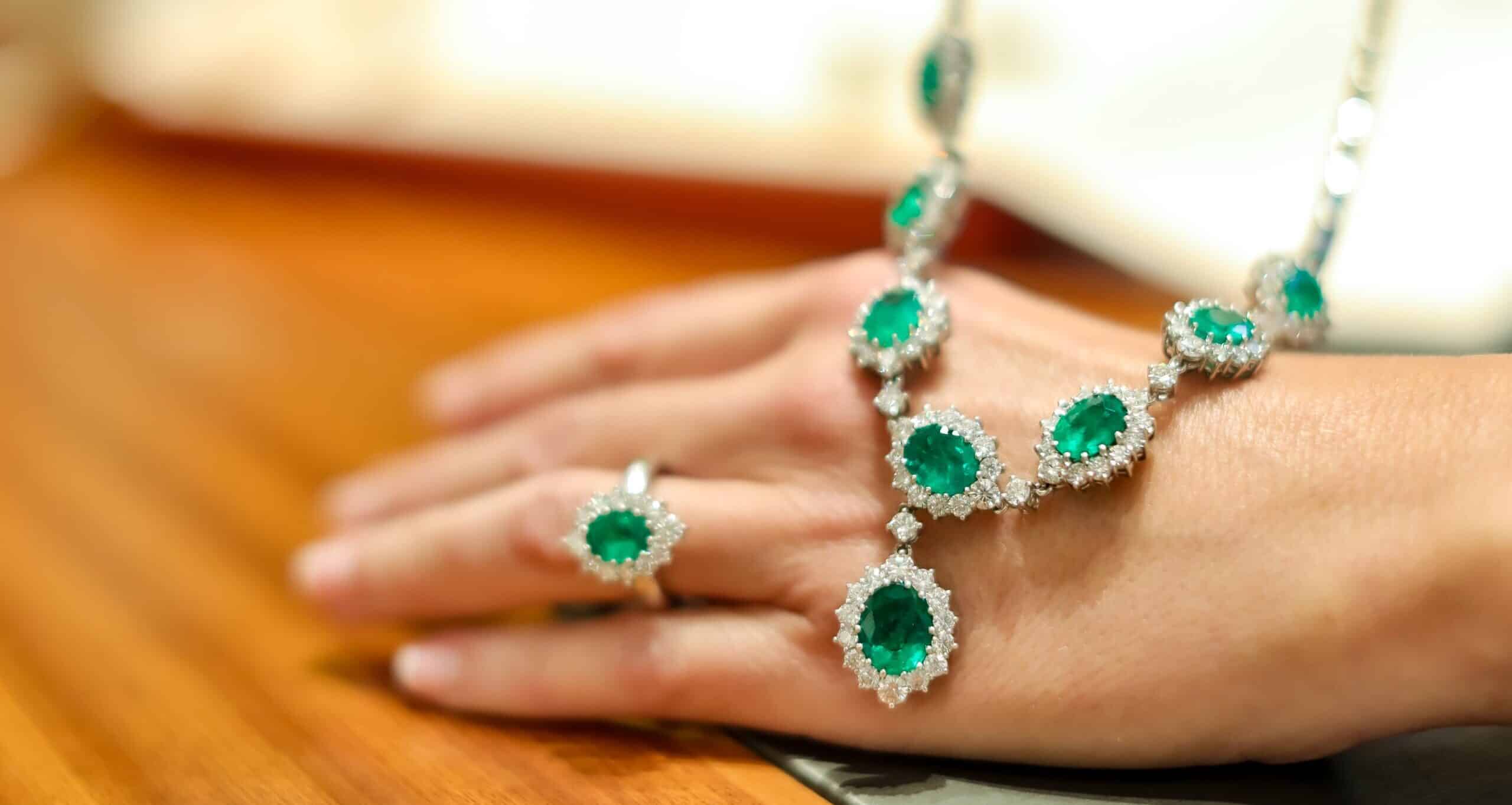 Pendants and ring of emeralds and diamonds