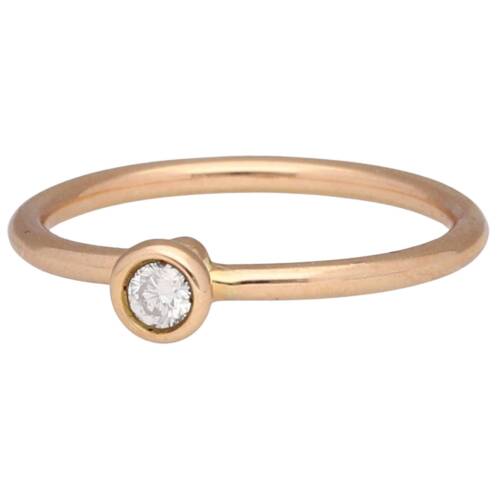 Rose gold solitaire ring with a chaton diamond