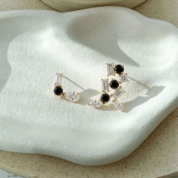 Pendientes asimetricos