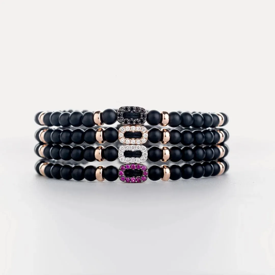 Black thread bracelets with diamonds and ruby